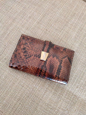 Vintage snakeskin pattern wallet used with gold details