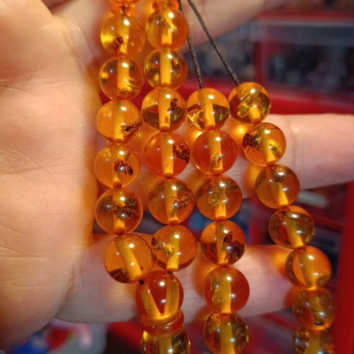 Worry beads handmade from bakelite with amber color and silver finish, new