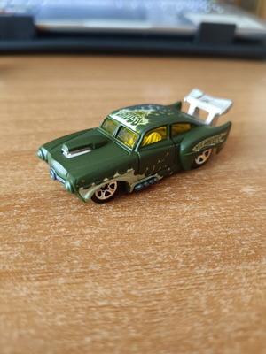 Hot Wheels toy car set with Mercury '50 Custom Boke Shaker, Chevy Pre Runner Baja Truck, Toyota Tacoma '12