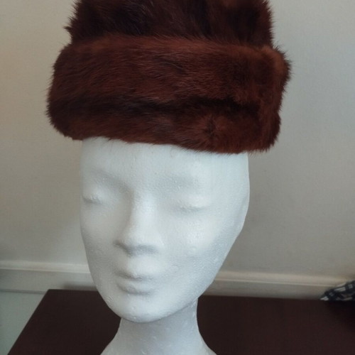 Women's hat made of authentic fur like new, brown