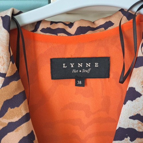 Lynne dress with animal print like new, size M