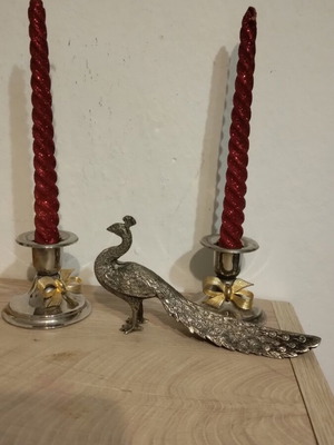 Silver-plated candlesticks with candles and peacock figurine like new