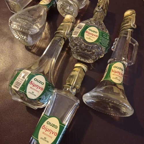 Miniature liquor bottles used, collection of 8 shaped like musical instruments