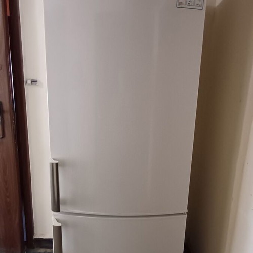AEG refrigerator model S-53600CSWO with freezer, parts condition