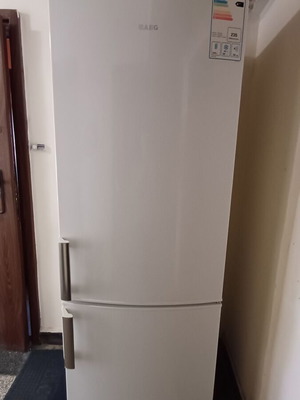AEG refrigerator model S-53600CSWO with freezer, parts condition