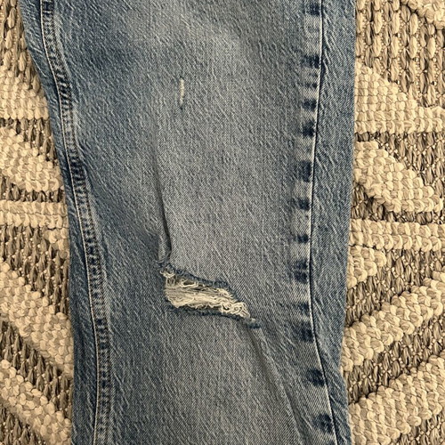 Zara women's jeans new, light blue with rips and frayed hems, size 34