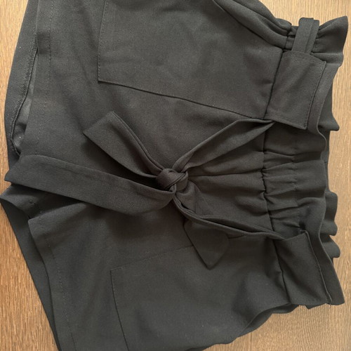 Black shorts with large pockets and belt