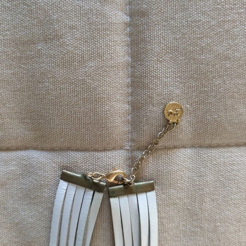 FL Private Collection necklace used with leather and coral elements