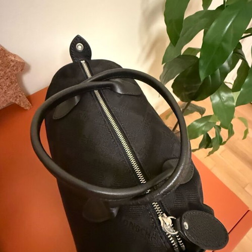 Longchamp all black handbag like new with jacquard monogram and leather details