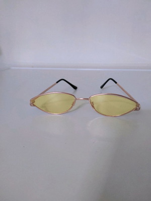Sunglasses used with yellow lens and lightweight frame