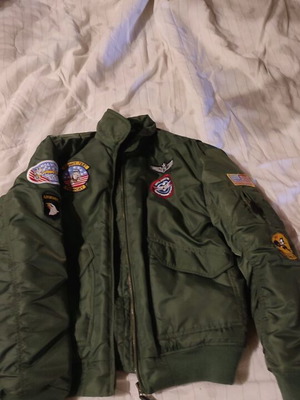 Flight jacket with embroidered patches like new, size 12