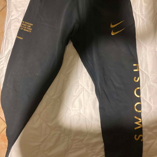 Nike Swoosh sweatpants used, size M, black with elastic cuffs