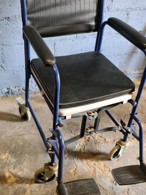 Wheelchair with commode like new