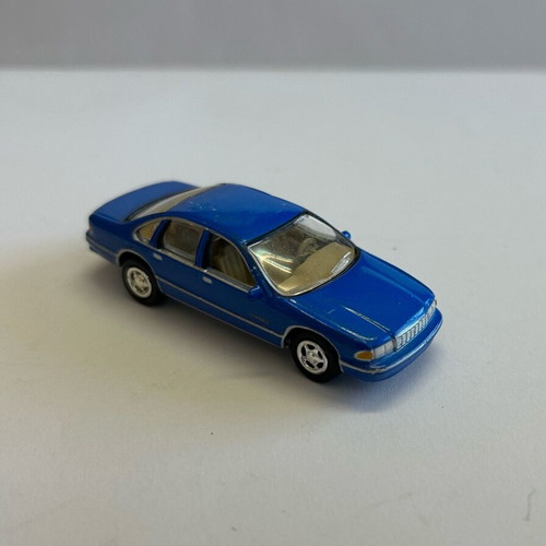 Johnny Lightning 1999 Chevy Caprice 1995 toy car used, very good condition