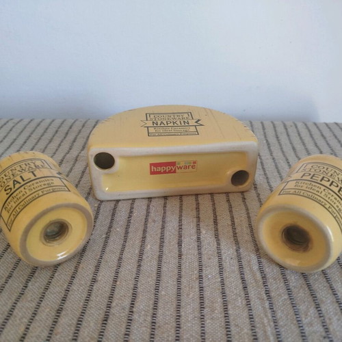 Salt and pepper set with napkin holder used