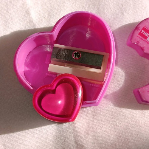 Pink heart-shaped sharpener with Yorkshire Terrier theme, like new