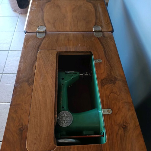 Sigma sewing machine used with wooden cabinet and bar door