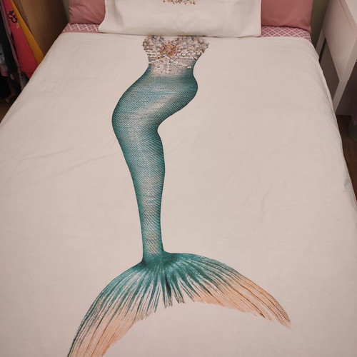 Snurk 2-in-1 duvet cover and blanket with mermaid design, organic cotton