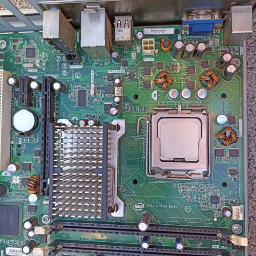 Intel DG31PR motherboard with Core 2 Duo E8400, 2GB DDR2 RAM, Cooler Master fan used