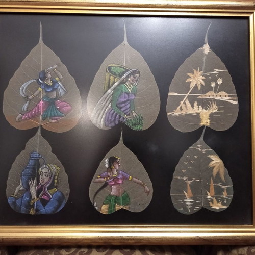 Painting with African figures hand-painted on dried leaves with gold frame and glass
