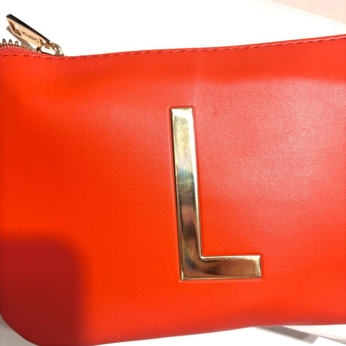 Carpisa orange handbag new with wristlet