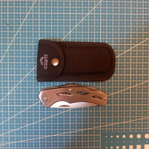 Crivit folding knife with belt sheath, like new