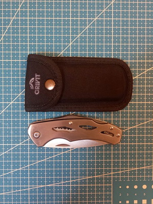 Crivit folding knife with belt sheath, like new