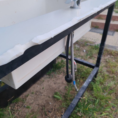 Corian sink with telescopic faucet like new