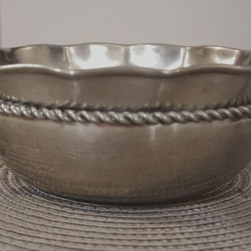 Metal decorative item used with perimeter detail