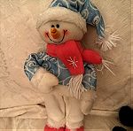  Χιονάνθρωπος καθήμενος χριστουγεννιάτικούς ακριβά αγορασμένος