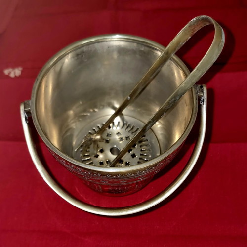 Silver-plated ice bucket like new with carved details and special handle