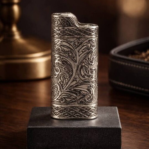 Vintage silver lighter case used with carved floral patterns
