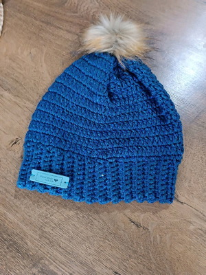 Knitted handmade hat new with blue sequins