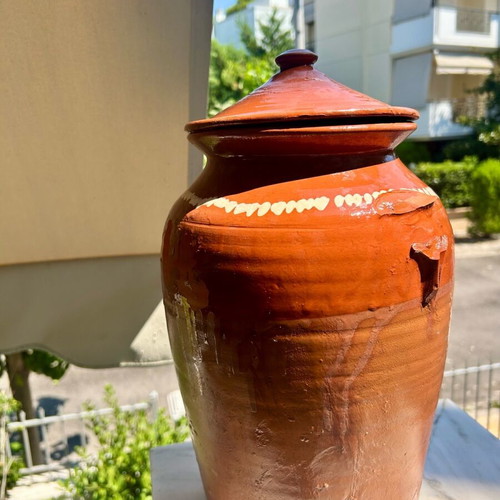 Old traditional ceramic jar used, handmade with lid