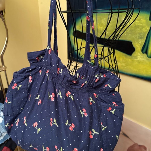 Navy bag with cherry print like new