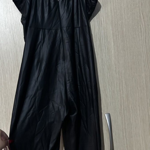 No Stress leather jumpsuit size S used with deep neckline and crisscross tie