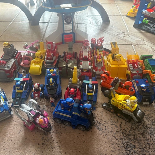 Paw Patrol vehicles with removable figures and headquarters like new