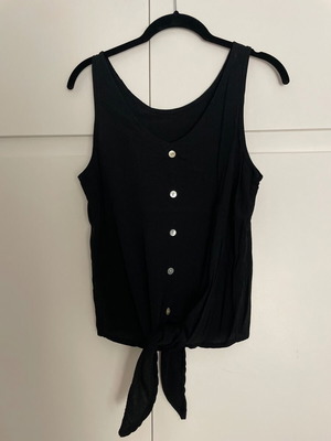 Sleeveless top with decorative buttons and tie, black, used
