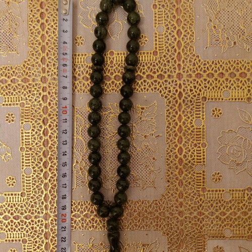 Decorative worry beads from semi-precious spiral stone