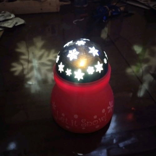 LED projector with moving white snowflakes, battery and mains powered