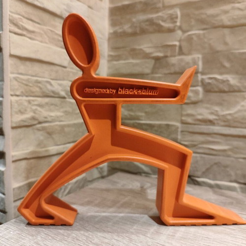 Doorstop "James the Doorman" like new, orange