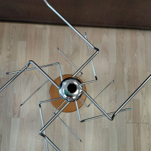 Metal three-tier countertop stand used with wooden base