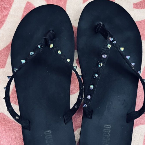 Cuccoo black flip flops like new with edgy iridescent spikes