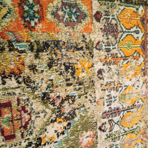Colorful oriental style rug with distressed look like new
