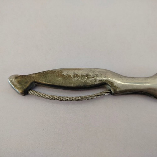Vintage metal letter opener with unique handle
