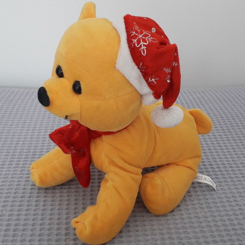 Yellow plush dog used, length 25 cm