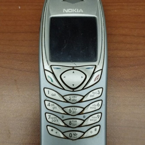 Nokia 6100 used, unknown condition, gray