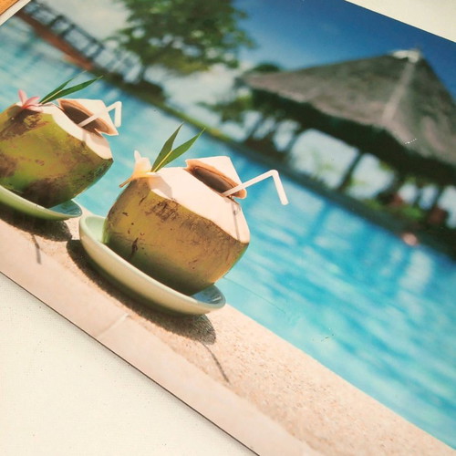 Wooden frame used with tropical pool and coconut motif