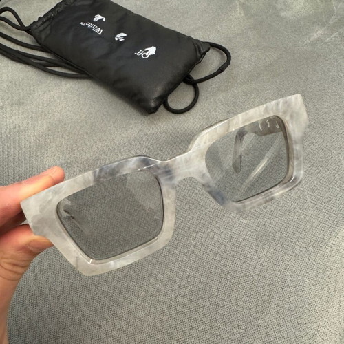 Off White marble sunglasses like new with box and case