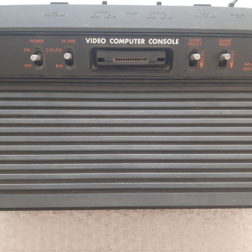Retro 1990 video game console used with built-in games